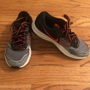 Size 11.5 . Boys Nike Tennis Shoe.